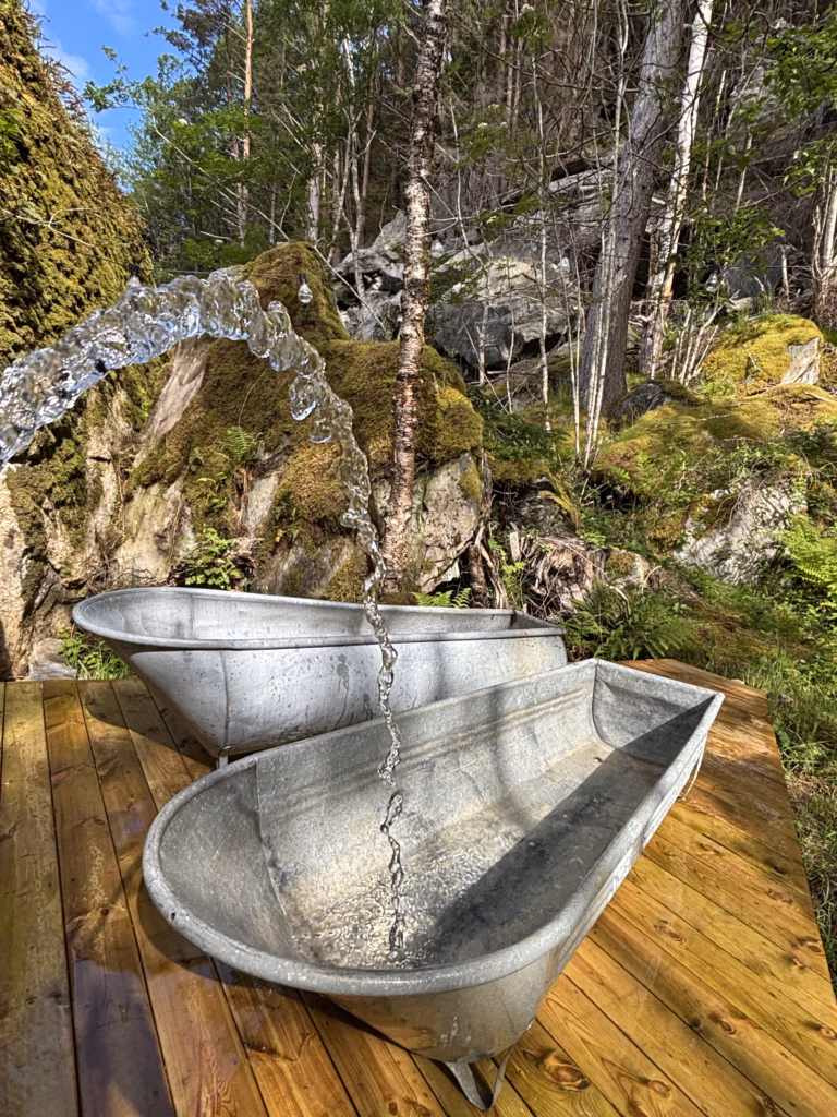 Filling the bathtubs with warm water at the Forge